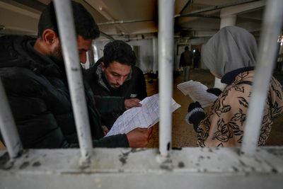 Syrians crowd Assad’s most notorious torture prison in hunt for missing loved ones