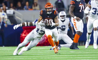 Chase Brown stole Ezekiel Elliott’s Salvation Army kettle touchdown celebration