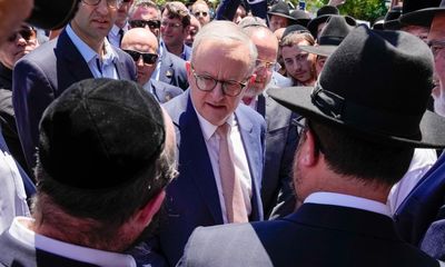 ‘This is just a photo op’: anger greets Albanese as he tours Melbourne synagogue destroyed by arson