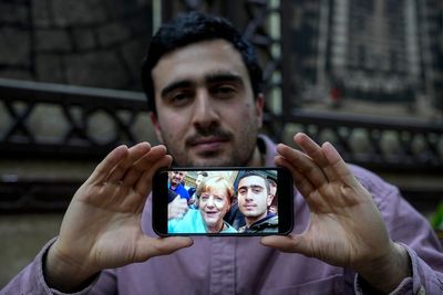 Syrians in Germany worried by some politicians' eagerness for them to go home after Assad's fall