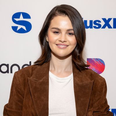 Selena Gomez Taps Into the Suede Trend With a Trench Coat Designed by a Style Icon