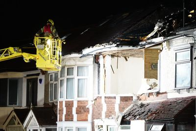 Firefighters tackle blaze at house in Ilford following explosion