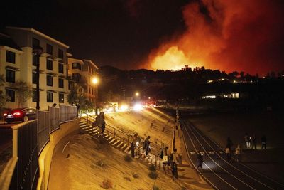 Thousands face evacuations in Malibu due to 'scary fast-moving' wildfires