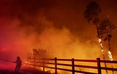 Thousands Told To Flee As Wildfire Tears Through California's Malibu