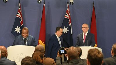 PM bets his 'life' NRL players will be safe in PNG