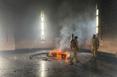 Syrian rebels set fire to tomb of Bashar al-Assad's father