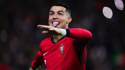 Cristiano Ronaldo reacts after Portugal are confirmed co-hosts of 2030 FIFA World Cup