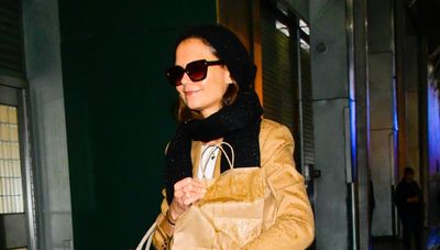 Katie Holmes reveals a clever way to wear flats this winter in ruby red Mary Janes and stylish cold-weather layers