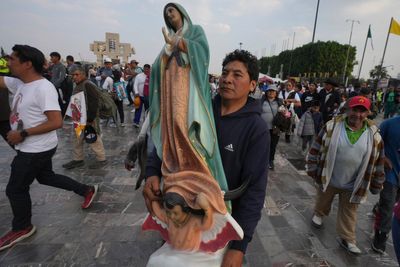 Millions mark Mexico's Virgin of Guadalupe Day but calls for a truce in drug violence go unheeded