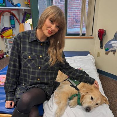 Taylor Swift Pairs a Festive Miu Miu Tartan Set With Winter's Reigning Boot Trend to Surprise Patients at a Children's Hospital