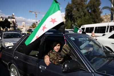 Celebration in Damascus as world leaders discuss challenges facing Syria