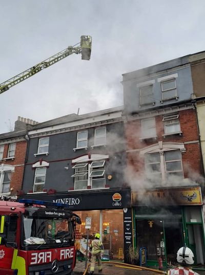 Willesden fire: Four rushed to hospital and two rescued after major blaze on north London high street