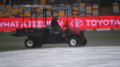 Australia survive before rain turns Gabba into a lake