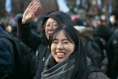 'I'm So Happy': Tears Of Joy, K-pop On Seoul Streets As Yoon Impeached