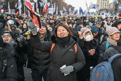 WATCH: South Koreans Celebrate President's Impeachment After His Martial Law Decree Nearly Plunged Country Into Political Crisis