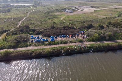 Five people killed in shootings near migrant camps in northern France