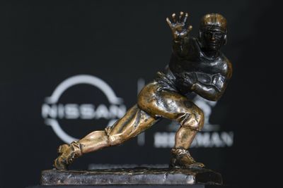 Cam Newton attends first Heisman Trophy ceremony since winning award in 2010. Here’s why he was absent and why he returned . . .