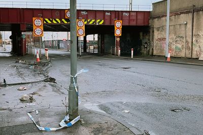 Man, 60, remains in critical condition after bus hits rail bridge