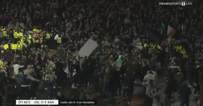 Jubilant Celtic fans storm Hampden track as trophy presentation delayed