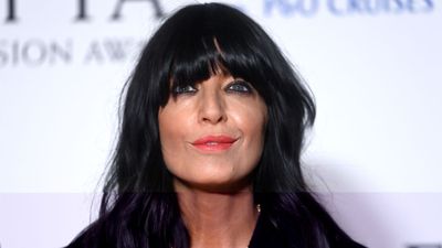 Claudia Winkleman proves a velvet bow is the chicest way to elevate classic tailoring