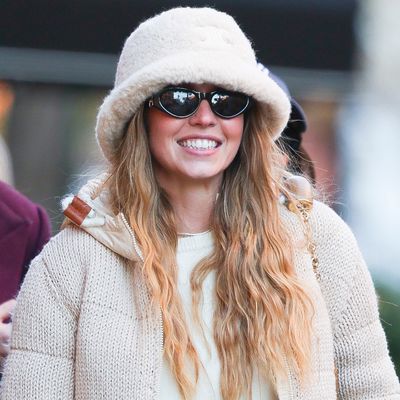 Sydney Sweeney Is the Face of Winter Maximalism in a Furry Bucket Hat and Cardigan Knit Puffer