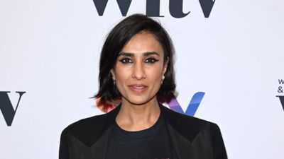 Anita Rani's oversized camel coat and bright pink beanie is the casual chic winter outfit we wouldn't have thought of