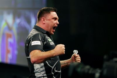 Gerwyn Price eases past Keane Barry to reach third round at Alexandra Palace