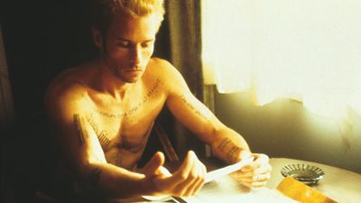 Memento star Guy Pearce says a Warner Bros. exec blocked him from more Christopher Nolan movies, including Batman Begins: "I think he just didn’t believe in me as an actor"