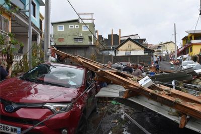 Authorities impose overnight curfew in cyclone-ravaged Mayotte as France rushes in aid