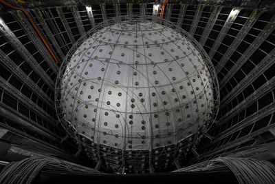 An underground detector in China will sniff out mysterious ghost particles called neutrinos