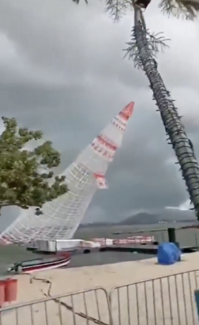 Man killed as 184ft floating Christmas tree collapses in storm in Brazil