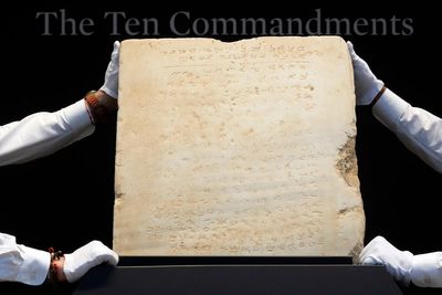 Ten Commandment tablet that was used as paving stone sells for millions