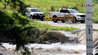 Boy survives being sucked into drain as floodwaters hit