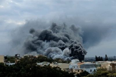 A massive fire kills 9 people at a building under construction in Taiwan