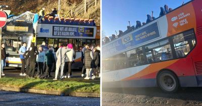 Eight in hospital after roof torn off double decker bus in railway bridge crash