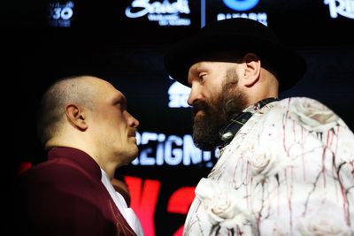 Tyson Fury and Oleksandr Usyk engage in tense 12-minute staredown at press conference