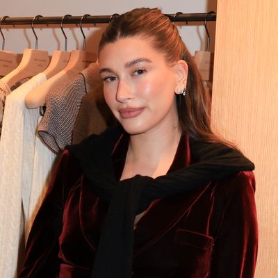 Hailey Bieber Winterizes Her Burgundy Leather Corset Dress With a Matching Mock Neck Top