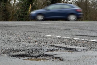 PM urges councils to ‘get on’ with fixing ‘broken roads’