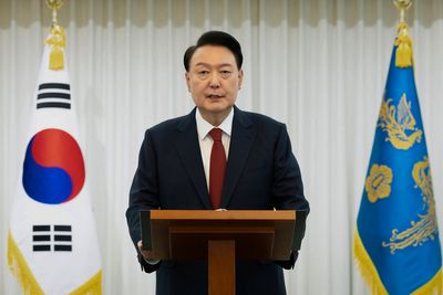 South Korean investigators seek to question reluctant president over martial law