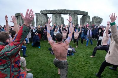 In pictures: Thousands gather at Stonehenge to mark winter solstice