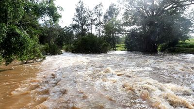 Flooding cuts off roads, more rainfall on its way