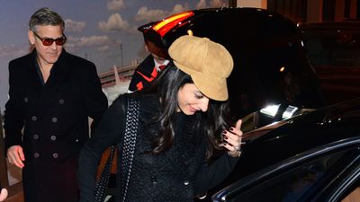 Leopard print knee boots and lieutenant cap? Amal Clooney shows how to turn a simple winter outfit into something ultra chic