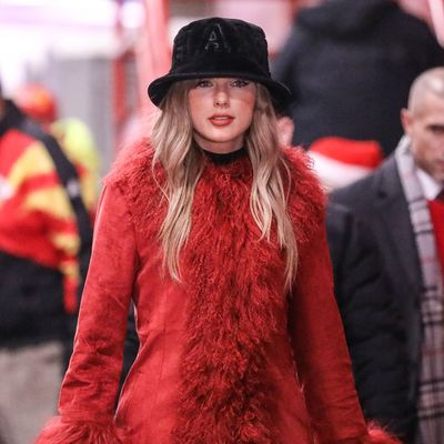 Taylor Swift Styles an Opulent Crimson Fur Coat Like a Chiefs Game Mini Dress