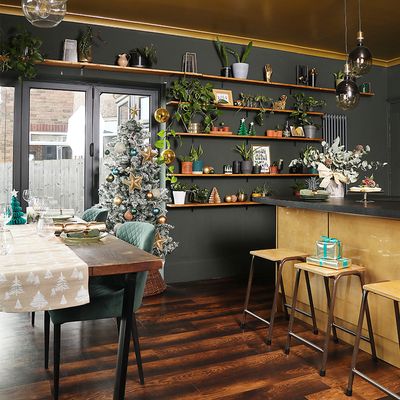 'The gold kitchen island is the star of the show…our space is perfect for Christmas hosting now!'