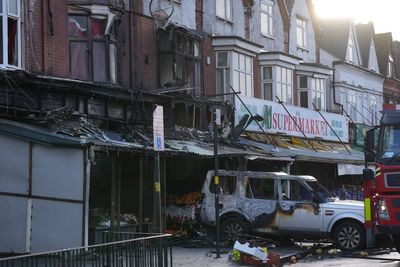 'It sounded like a bomb going off': Police investigate 'arson' after car crashes into supermarket