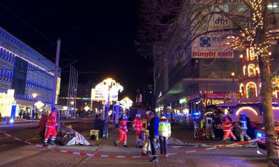 Two killed and scores injured in Germany as car ploughs into crowd at Christmas market