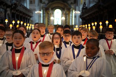 AP PHOTOS: Girls will be part of St. Paul's Cathedral choir on Christmas Day for first time