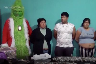 WATCH: Undercover Cop in Grinch Costume Busts Peruvian Drug Gang in Christmas-Themed Raid