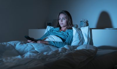 Is watching TV in bed that bad for your sleep? Here's what the experts say