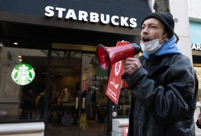 Starbucks' worker strike expands to a dozen major U.S. cities after employees say the chain offered an 'insulting economic package'